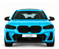 BMW X4 G02 · Facelift M40i – Frontansicht in Türkis Metallic, schwarze Anbauteile, dunkle ausgeschaltete Scheinwerfer und Original-ILLICIUM-Kennzeichen