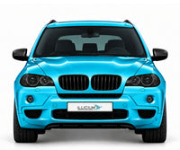 BMW X5 E70 · M Sport Vorfacelift – Frontansicht in Türkis Metallic, schwarze Anbauteile, ausgeschaltete dunkle Scheinwerfer und Original-ILLICIUM-Kennzeichen