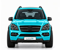 GL X164 · Original-AMG-Zubehör · Vorfacelift – Fahrzeugillustration in Türkis Metallic, schwarze Anbauteile, neutrale Emblemform und ILLICIUM-Kennzeichen